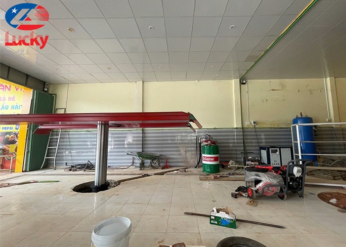 Cầu nâng 1 trụ dương nền chữ H